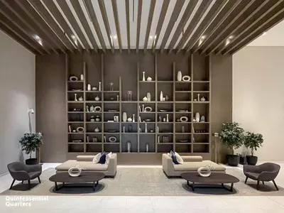 a living room with two couches and a book shelf at Spacious & Full of light 3BR+ kids Dubai Mall in Dubai