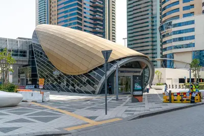 a building in a city with tall buildings at Modern 1BR with City View Rooftop Pool Access in Dubai