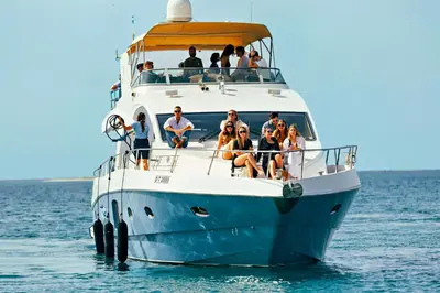 a group of people on a boat in the water at Voco Dubai Monaco, The Heart of Europe by IHG-Adult only in Dubai
