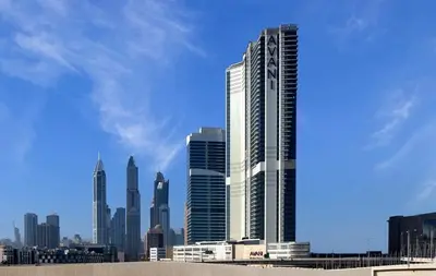 a view of a city skyline with tall buildings at ON OFF HH-AVANI HOTEL-3BR -Full Palm View in Dubai