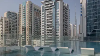 a view of a city with tall buildings at AWS Holiday Homes - Luxury Living besides Canal in Dubai