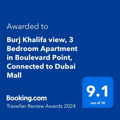 a screenshot of a cell phone with the text upgraded to but kahlia view at Burj Khalifa view, 3 Bedroom Apartment in Boulevard Point, Connected to Dubai Mall in Dubai