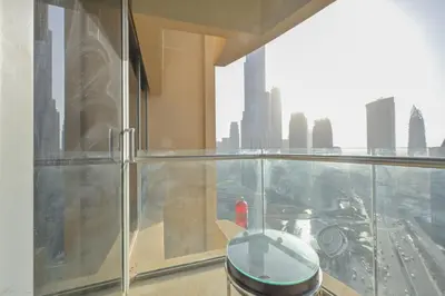 a balcony with a view of a city at Emaar Fashion Avenue - Formerly Address Dubai Mall Residence in Dubai