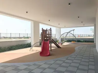 a playground in a building with a red slide at Frank Porter - DAMAC Celestia in Dubai