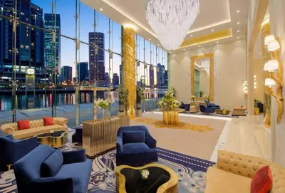 a large lobby with a view of a city at DAMAC MAISON PRIVE in Dubai