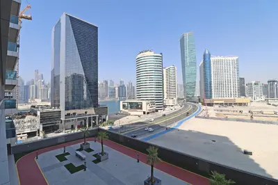 a view of a city with tall buildings at Spacious Apartment with Balcony Near Dubai Mall in Dubai