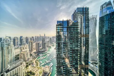 a view of a city with tall buildings and a river at The Marina PENTHOUSE near JBR 46th Floor in Dubai