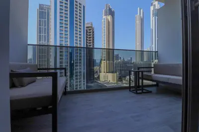 a balcony with a view of a city skyline at Luxury MAG 318 Studio Near Dubai Mall in Dubai