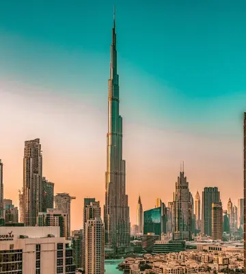 a city skyline with the tallest building in the world at Elite Royal Apartment - Panoramic Burj Khalifa, Fountain & Dubai skyline view - Marquise in Dubai