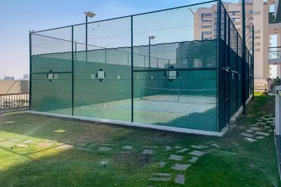 a batting cage on a tennis court at Frank Porter - Starz by Danube in Dubai