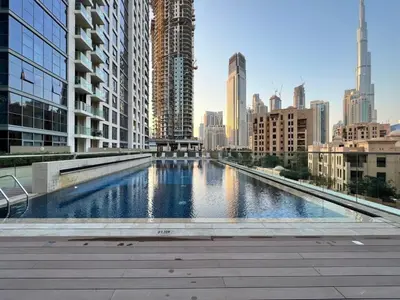 a swimming pool in a city with tall buildings at Silkhaus unique 1BDR pad gorgeous view in new tower in Dubai