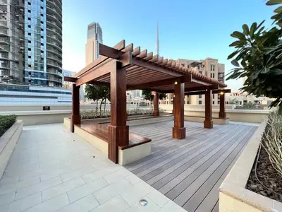 a wooden pavilion on the roof of a building at Silkhaus unique 1BDR pad gorgeous view in new tower in Dubai
