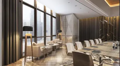 a dining room with a long table and white chairs at Paramount Midtown -Stunning 2 Bedroom Apt with Burj-Khalifa view in Dubai