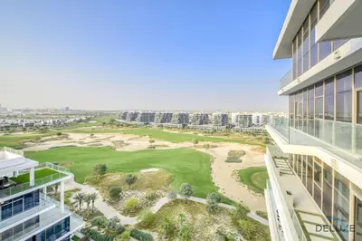 a view of a golf course from a building at Sunlit Studio at Golf Promenade 2A DAMAC Hills By Deluxe Holiday Homes in Dubai