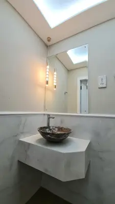 a bathroom with a sink and a mirror at Marco Polo - Experience beachfront luxury at Bahar 6 JBR in Dubai
