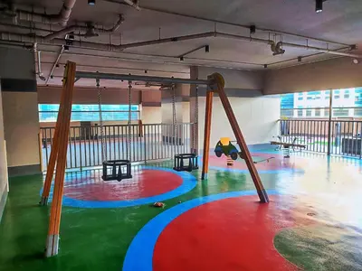 an empty room with a playground with a swing at White Sage - Elite Residence Studio in Dubai