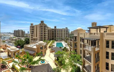 an aerial view of a city with tall buildings at Luxury 1BD apartment in Madinat Jumeirah Living in Dubai