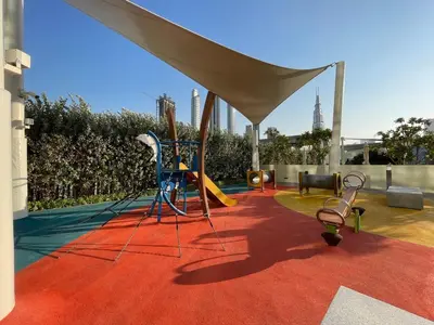 a playground on the roof of a house at GuestReady - Luxury Tower with Burj Khalifa View in Dubai