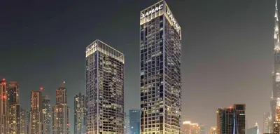 a rendering of a tall building in a city at DAMAC MAISON PRIVE in Dubai