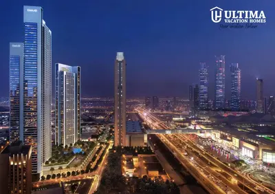 a view of a city at night with buildings at Elegant Apartment with Direct access to Dubai Mall in Dubai