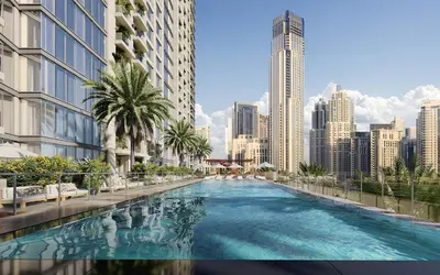 a swimming pool in the middle of a city at Glamorous Apartment Facing Burj Khalifa in Dubai