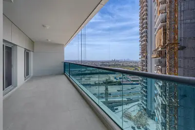 an empty balcony with a view of a city at Cozy Family Apt Canal Vista Near Dubai Mall in Dubai