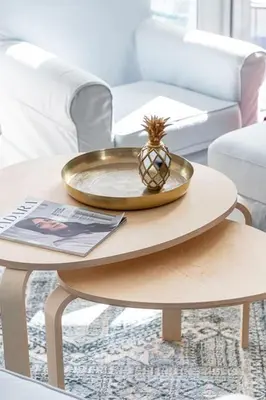 a table with a plate and a pineapple on it at Frank Porter - Silverene Tower B in Dubai
