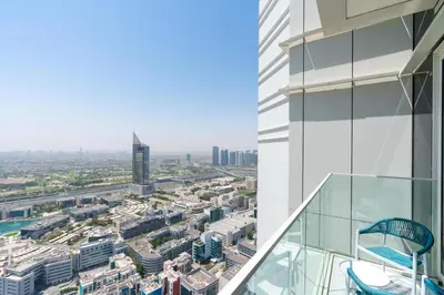 a view of a city from a building at Avani Palm Burj-AlArab View from the pool in Dubai