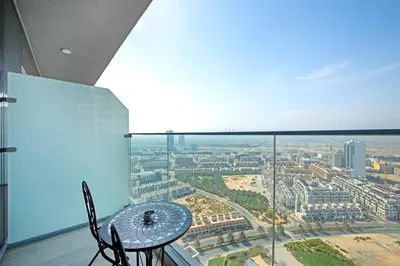 a room with a table and a view of a city at Apartment on 26th Floor & Beautiful Views (2 adults + 2 kids) in Dubai