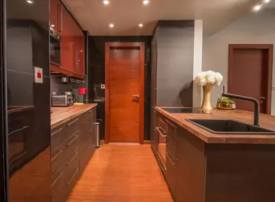 a kitchen with a sink and a counter top at Luxurious 2BR - Fully Upgraded - High-end facilities in Dubai