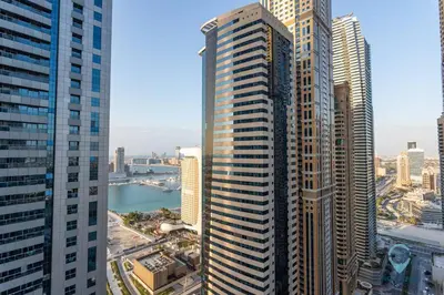 a view of a tall building in a city at Modern 2BR in the Heart of Dubai Marina in Dubai