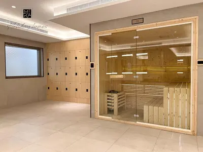 a room with a large glass door in a room at Mira Holiday Homes - Newly furnished studio in Downtown in Dubai