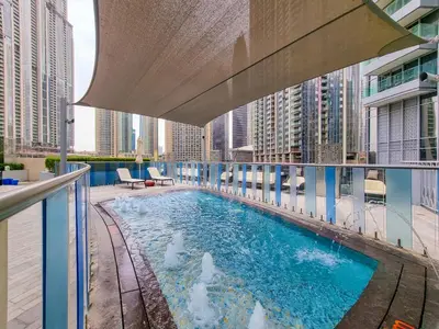 a swimming pool on the roof of a building at EDEN'S Homes & Villas - Opera Grand in Dubai