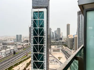 a view of a tall building in a city at Luton Vacation Homes - Damac Paramount Midtown Business Bay Dubai - 37AB09 in Dubai