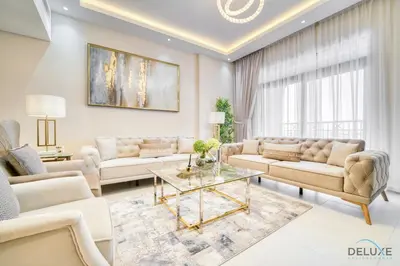 a living room with couches and a table at Exclusive Deal Stunning 1BR at Madinat Jumeirah by Deluxe Holiday Homes in Dubai