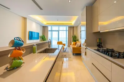 a kitchen with a sink and a counter top at Spacious beachfront 2 bedroom apartment - The 8 in Dubai