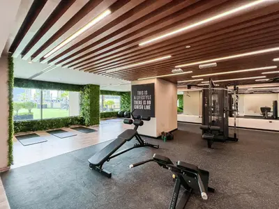 a gym with two exercise bikes in a room at Luton Vacation Homes - Elite Downtown Residence, Burj Khalifa View Dubai - 19AB01 in Dubai