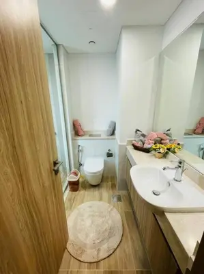 a bathroom with a sink and a toilet at Elite Inn: Amaranta75 (Townhouse Direct pool view) in Dubai