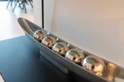a row of knobs on a stove in a kitchen at Ultimate Stay / 4 Beds / Burj Khalifa View / Ultra Modern / Business Bay in Dubai