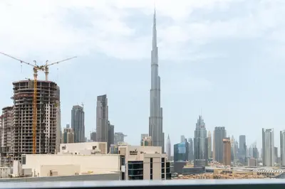 a view of a city skyline with the tallest building at Ultimate Stay / 4 Beds / Burj Khalifa View / Ultra Modern / Business Bay in Dubai