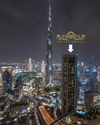 a city skyline at night with the first glass makers building at Stylish 3BR Burj Khalifa, Fountain Views, Pool & Prime Location in Dubai