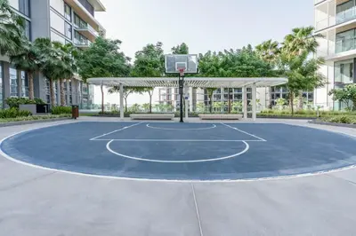 a basketball court with a basketball hoop at GuestReady - Stunning Apartment in Bluewaters in Dubai