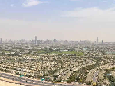 an aerial view of a city with a city skyline at 180° Sheik Zayed Road balcony views 2BR in JLT in Dubai