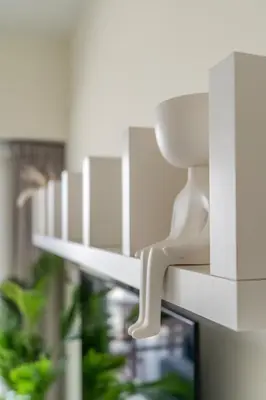 a model of a white bench in a building at GuestReady - Stylish Apt in Business Bay in Dubai