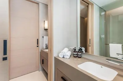a bathroom with a sink and a mirror at 72 floor 2BR at the Address JBR with Marina Views! in Dubai