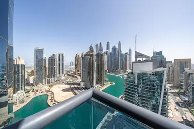 a view of the city from the top of a skyscraper at Spacious 3BR with 180˚ Dubai Marina Views in Dubai