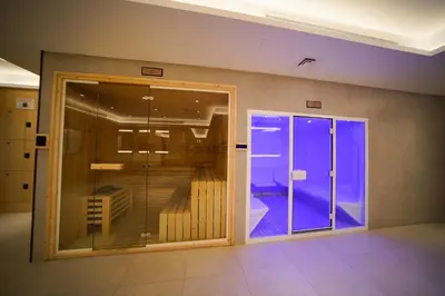 a room with a glass door with a balcony at Luxury Burj Khalifa View Studio Elite Downtown - 18AB19AB03 in Dubai