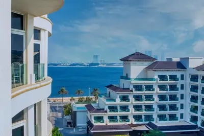 a view of the ocean from a building at GlobalStay Royal Bay Beachfront Apartments Palm Jumeirah in Dubai