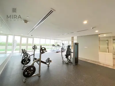 a gym with treadmills and cardio equipment in a building at Mira Holiday Homes - Newly furnished 1 bedroom in Business Bay in Dubai