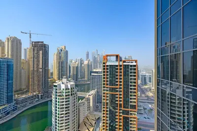a view of a city skyline with tall buildings at Marina Canal Views from the Balcony, Close to Marina Mall, The Address Residences, Dubai Marina by Deluxe Holiday Homes in Dubai